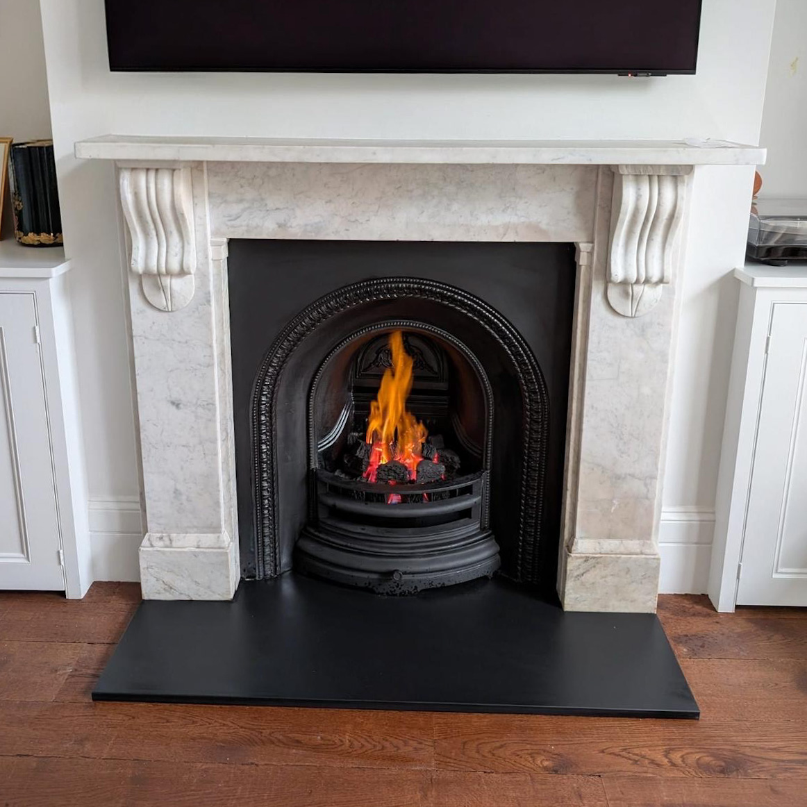 Customer's original mantel, "Better Hearth" arch inset, gas fire